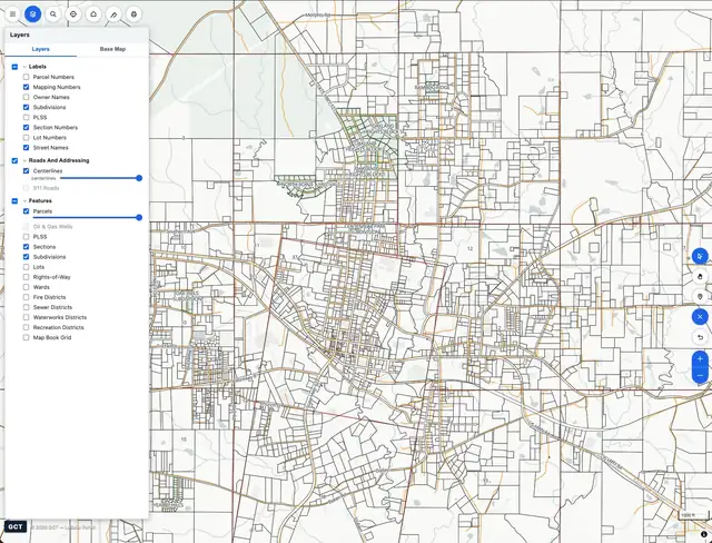 Modern viewer: a light topographic parcel map with an icon rail and a layers flyout controlling labels, roads, and features